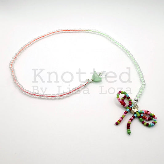 Colorful string beaded bookmark with bow and mushroom charms