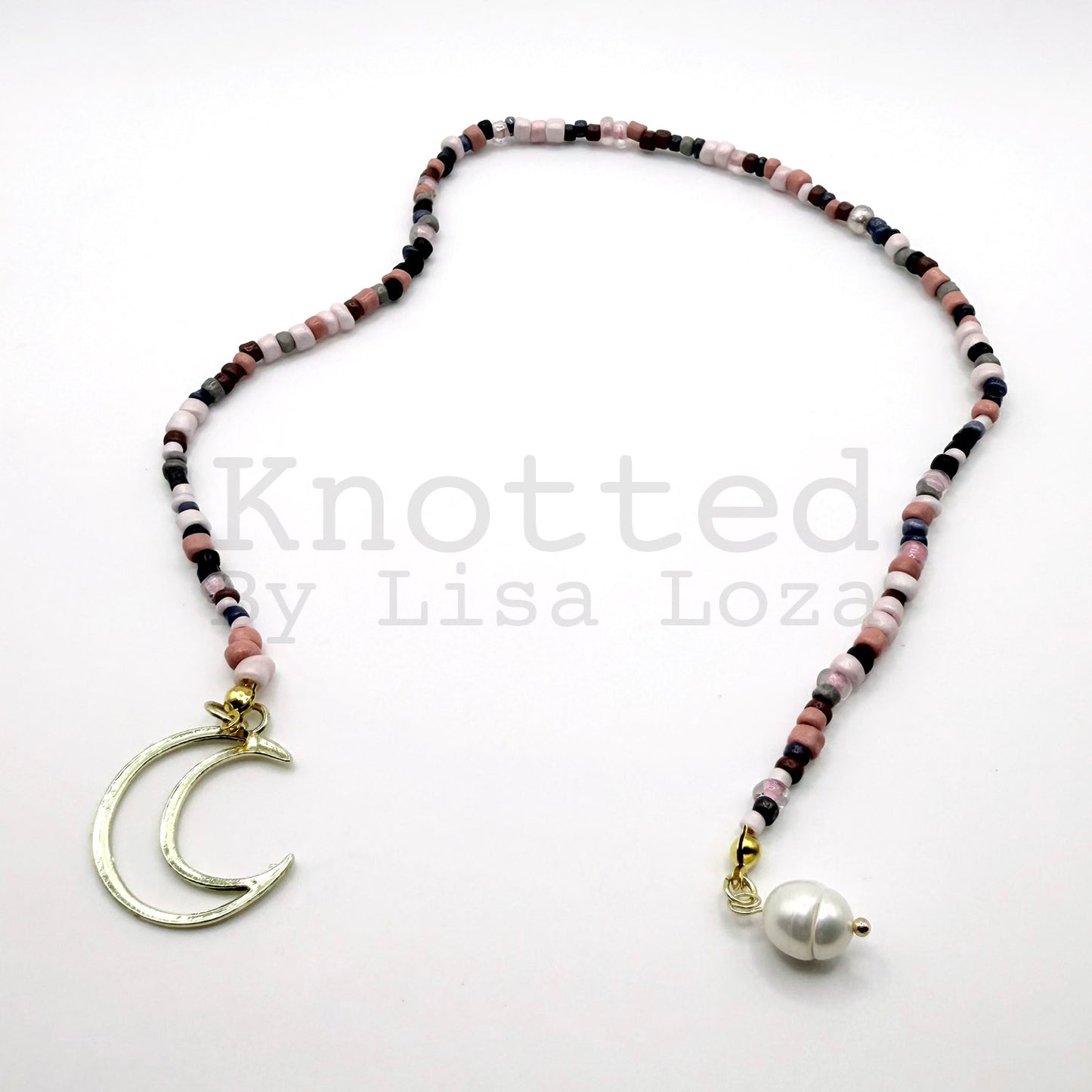 Pink beaded bookmark with crescent moon and pearl charms by Knotted by Lisa Loza