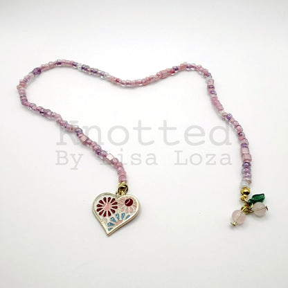 Pink beaded bookmark with flower, heart, and cherry charms