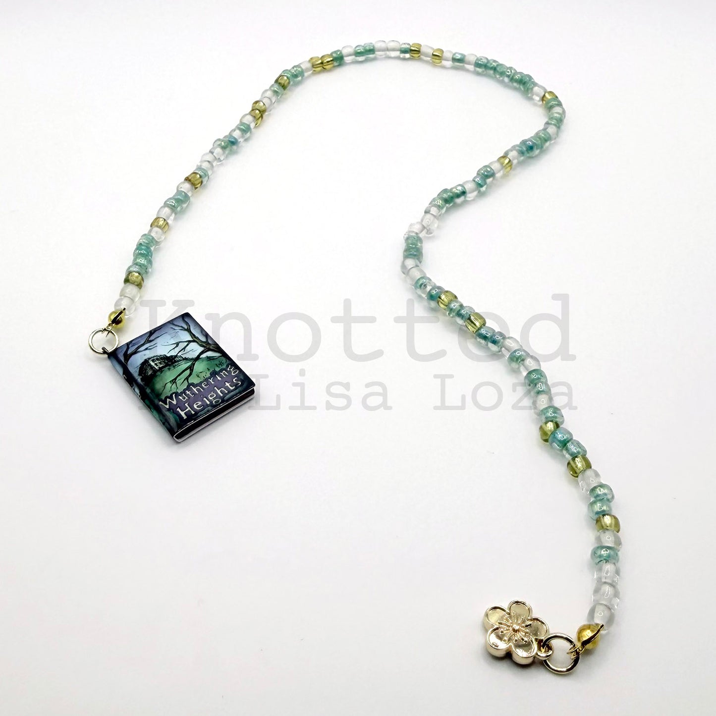 Teal and gold beaded bookmark with Wuthering Heights book and flower charms