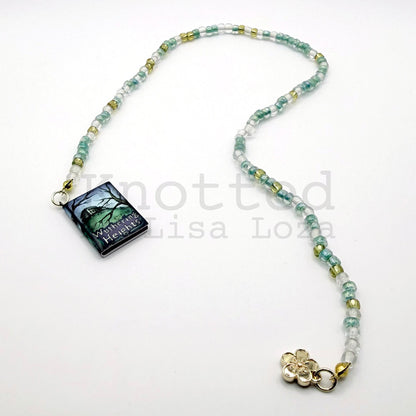 Teal and gold beaded bookmark with Wuthering Heights book and flower charms