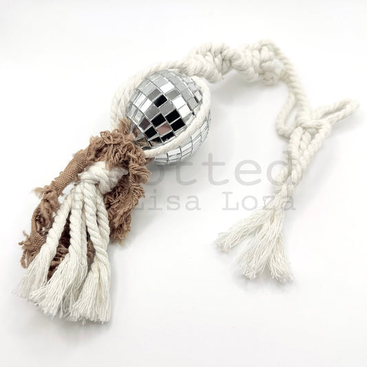 White and peach macramé disco ball car charm by Knotted by Lisa Loza
