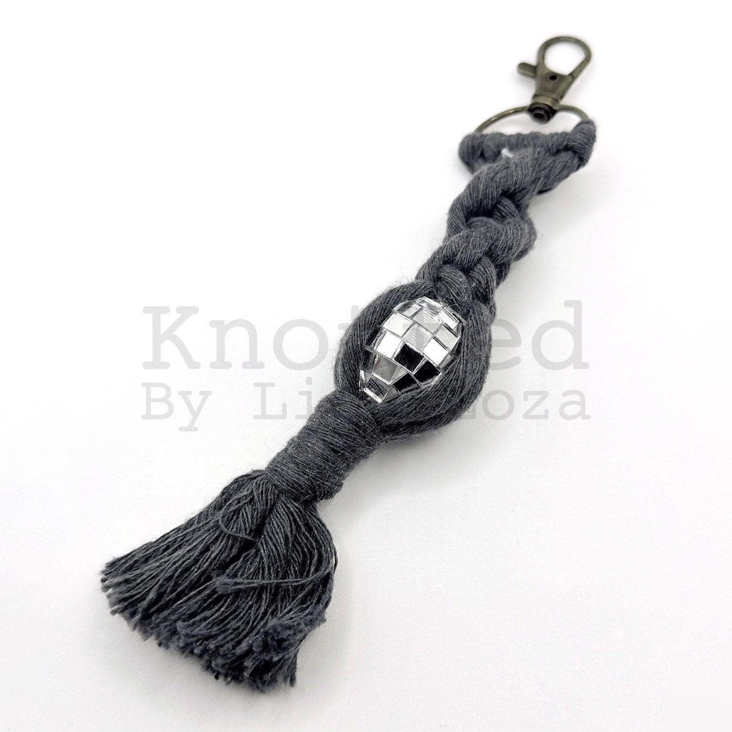Dark gray macramé disco ball keychain by Knotted by Lisa Loza