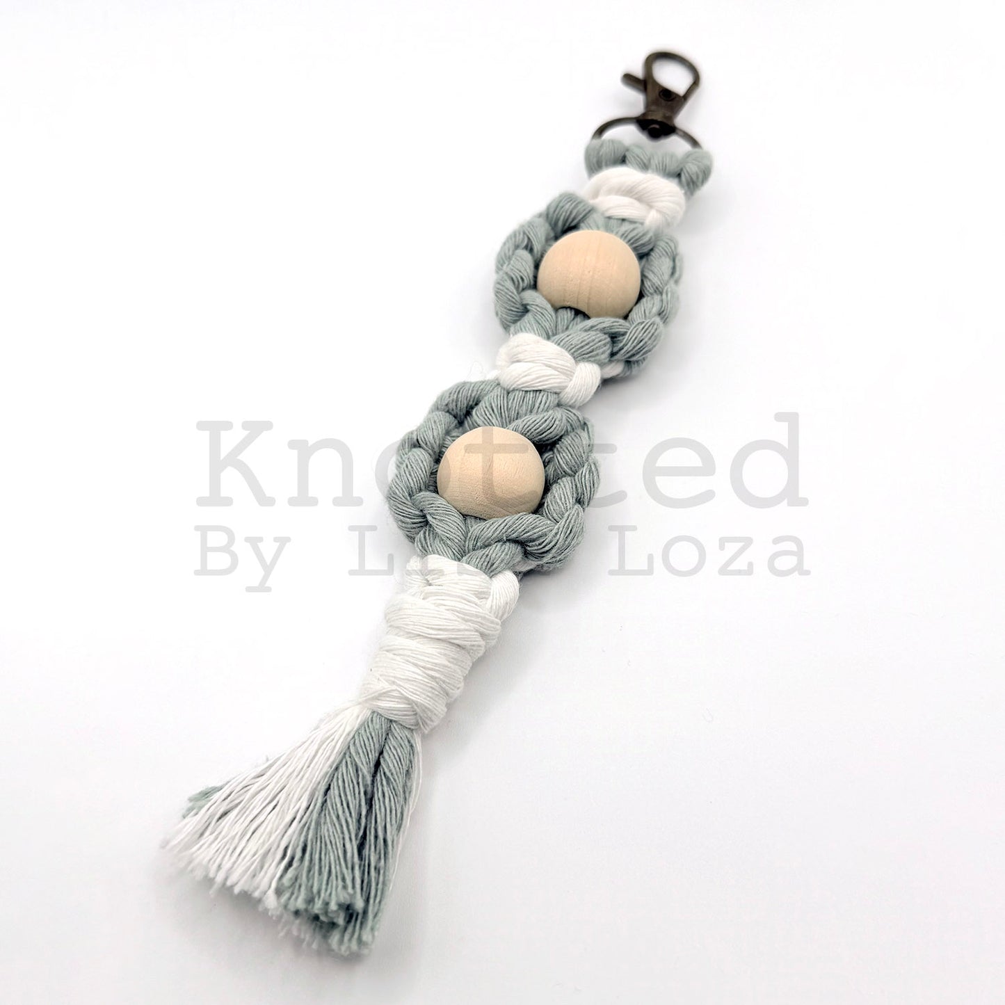 Teal macramé flower keychain by Knotted by Lisa Loza